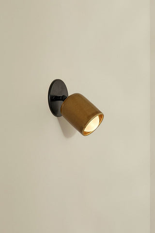 Marz Designs Terra 1 articulating wall light, chartreuse and black.