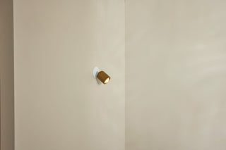 Marz Designs Terra 1 articulating chartreuse spotlight on white wall