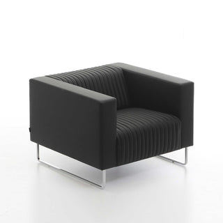 Mona armchair, black leather with ribbed seat and chrome legs.