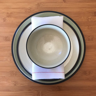 NASH Eir white napkins with plate and bowl setting