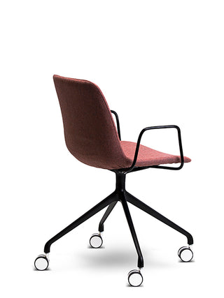 Red office chair with black metal frame and wheels on a white background