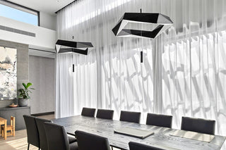 Modern dining room with geometric lighting