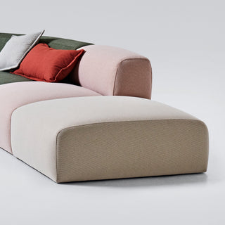 Ottoman sectional sofa with colorful cushions