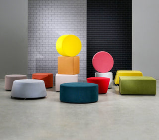 Assorted colorful ottomans on display