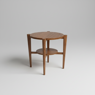 Wooden side table with a round top and shelf on a gray background