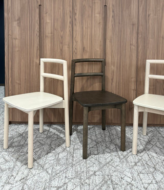 Wooden chairs in a showroom setting, photo from 1/20/2025.