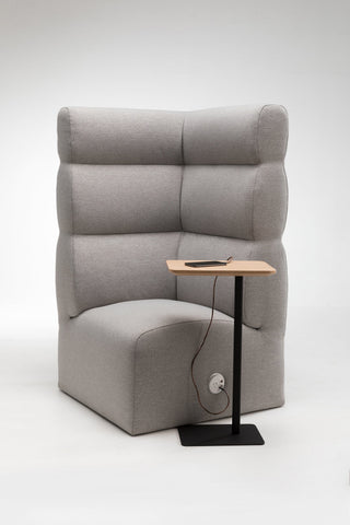 Puffalo chair with tablet on side table