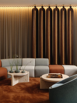 modern living room with seating and decor.