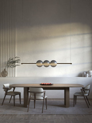 Modern dining room with pendant lights and table