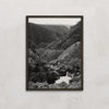 Tia Falls framed black and white landscape on wall