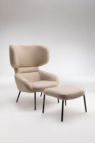 Beige armchair and matching ottoman.
