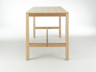 Wooden table with four legs.