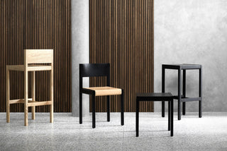 Wooden chairs and stools.