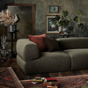 Puffalolounge couch with decor and rug