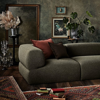 Puffalo Lounge sofa with pillows and decor