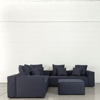 Baxter5 navy sectional sofa with ottoman