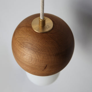BrightBeads sphere pendant light, wood and brass detail