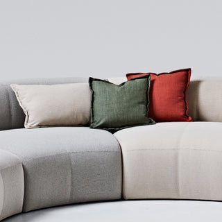Cushions on modern sofa in neutral colors