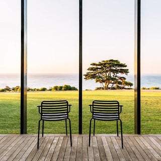 Didier Bombala outdoor chairs overlooking ocean