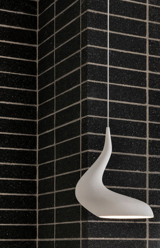 White Dollop pendant lamp on dark brick wall