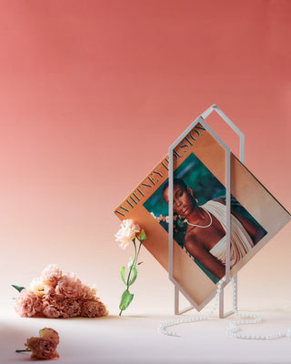 IdleHands November 2020 Whitney Houston album display with flowers.