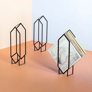Black metal bookends with a book