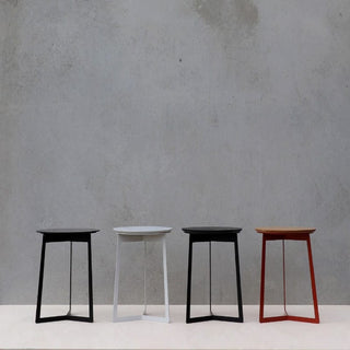 Modern stools in black, white, and red