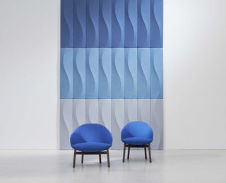 Marina Mini Blue Duo chairs in front of blue wave wall