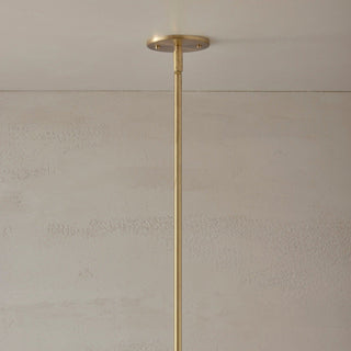 Brass ceiling rose solid dropper on a level ceiling by Marz Designs.