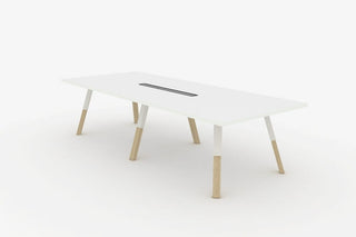 Nookie boardroom table with white top and wooden legs
