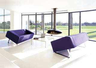 Purple Obelisk-style sofas in modern living room