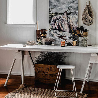 Rustic desk with art and decor
