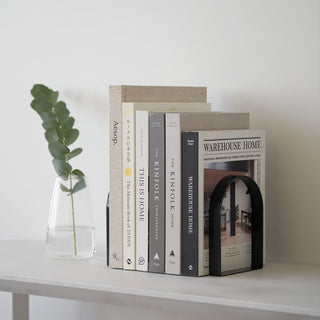 Books on shelf with bookends