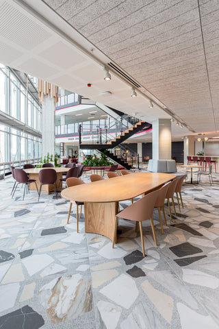 Office interior photo from July 16, 2020, featuring seating areas and staircase