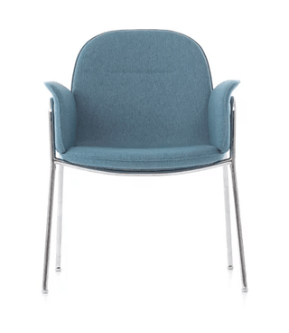 Blue upholstered chair with chrome legs