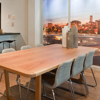 Ross Didier Tiller Slim Collection dining table with city view