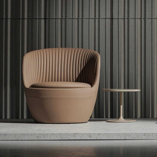Shelly beige wide shot of modern armchair and table