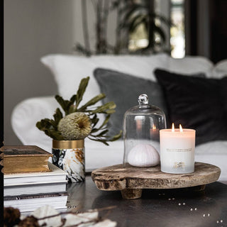 Candle and decor on coffee table