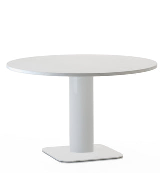 White round table with single pedestal base.